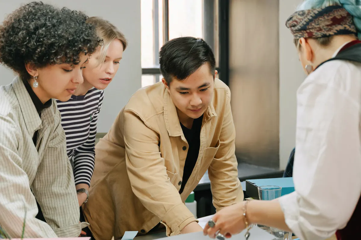 Design team reviewing blueprints, 方案与图纸会审